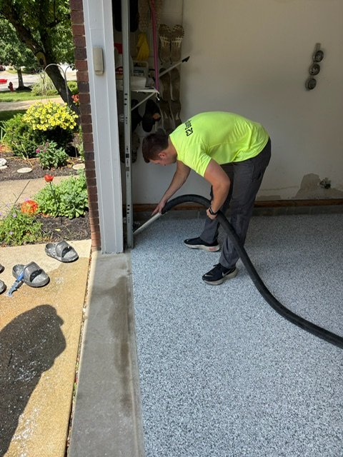 Cleaning fresh flake at garage entrance